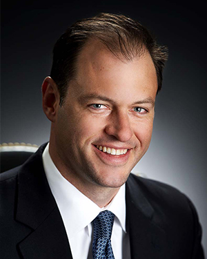 John W. Glomb Jr., President & CEO