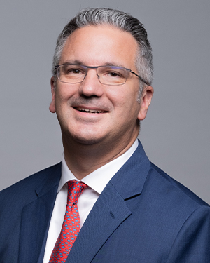 Christian Sandric, AIG